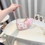 Túi cầm tay mini họa tiết thỏ xinh ngộ nghĩnh kèm charm gấu xinh xỉu cho bé gái- ST276
