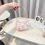 Túi cầm tay mini họa tiết thỏ xinh ngộ nghĩnh kèm charm gấu xinh xỉu cho bé gái- ST276