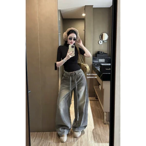 Quần jeans mài bạc đính đá dây đai