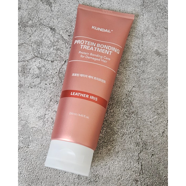 Dầu xả liên kết Protein giúp tóc bóng mượt KUNDAL PROTEIN BONDING TREATMENT LEATHER IRIS 250ml | DAMDAVN