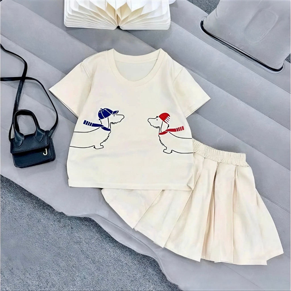 2-15 tuổi. Sét chân váy xếp ly có lót trong cho bé gái in họa tiết 2 chú cún,chất vải cotton thoáng mát.V07