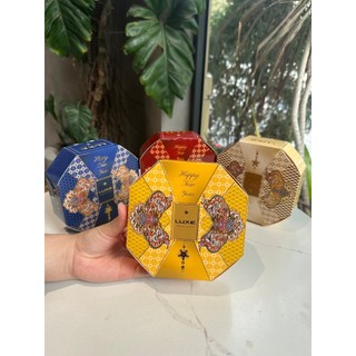Hộp lục bát giác phượng hoàng giấy đựng bánh kẹo lên set quà tết 2026