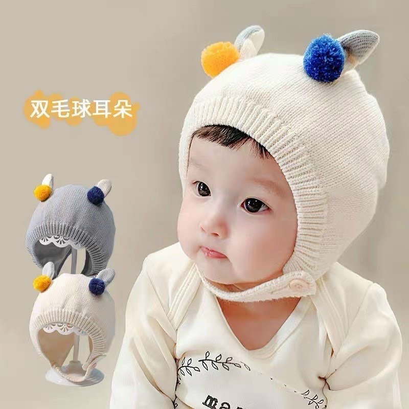 Mũ 2 quả bông giữ ấm mùa đông có quai giữ cằm cho bé saubabi