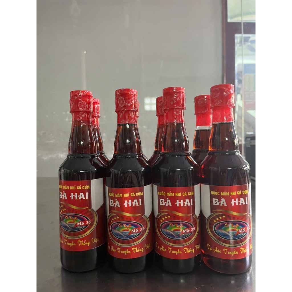 Lốc Chai Tròn Nhựa Tiết Kiệm Nước Mắm Cá Cơm Loại 1 Bà Hai ( 8 chai x 500ml )