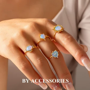 Nhẫn nữ titan tạo hình mặt trái tim giọt nước khảm đá ánh xanh lấp lánh mạ vàng 18K không gỉ WR2536 BY ACCESSORIES