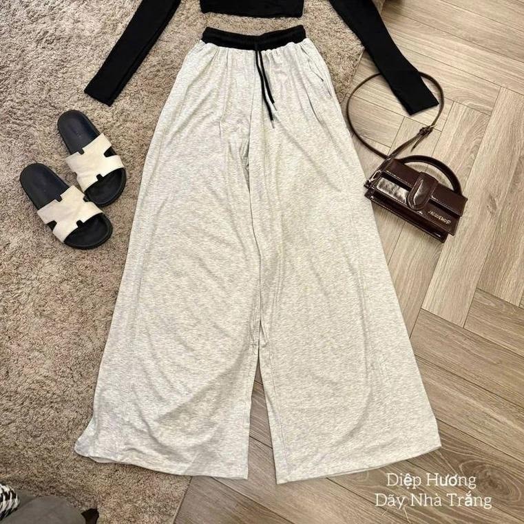 Quần nỉ dài ống rộng cạp chun phối màu đỏ đen Chất Nỉ tàu mềm mại cực dày dặn rất rễ phối với nhiều kiểu áo