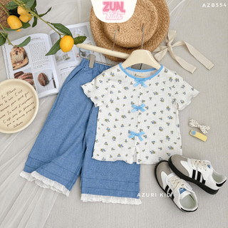 Bộ Đồ Bé Gái DORI Áo Thun Hoa Đính Nơ Quần Lửng Viền Ren – Bộ Bé Gái Dễ Thương Size 2–10 Tuổi
