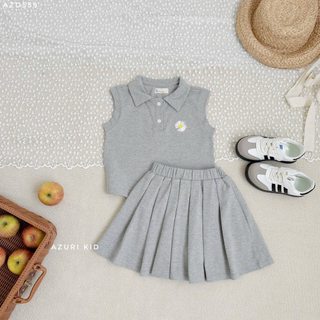 Bộ Bé Gái Thun Cá Sấu Cotton Cúc Daisy | Áo Polo + Chân Váy Xếp Ly Có Quần Bảo Hộ Bên Trong