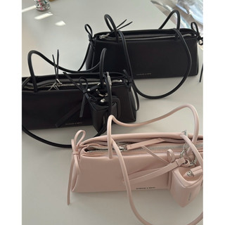 Túi đeo vai Bow Elongated Trapeze Charles & Keith