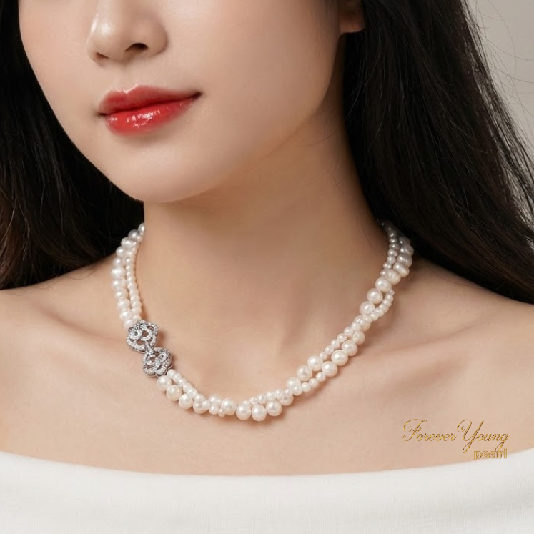 DC251 - Dây chuyền ngọc Trai 6-7 li xoắn, mặt khóa mạ vàng trắng, chiều dài 42-48cm, thiết kế thanh lịch.