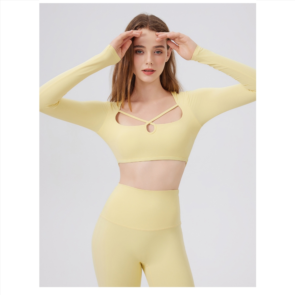【Fumeng】Áo dài tay tập gym cổ chéo lỗ thấm hút nhanh tạo dáng  Quần flare cao eo giao chéo sau không may thoáng khí nữ