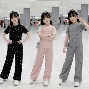 Sét đồ bộ cho bé gái cấp 1,cấp 2 chất vải tăm lạnh in full nơ phối quần ống xuông co giãn 4 chiều.M13