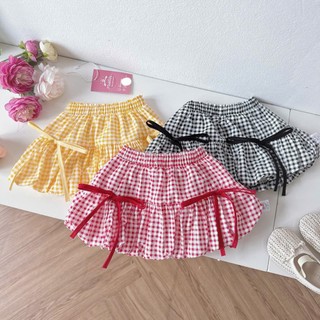 [8-26kg] Chân Váy Bí Caro Phối Nơ Cho Bé Gái Chất Thô Lụa (Đỏ/ Đen/ Vàng)