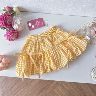 [8-26kg] Chân Váy Bí Caro Phối Nơ Cho Bé Gái Chất Thô Lụa (Đỏ/ Đen/ Vàng)