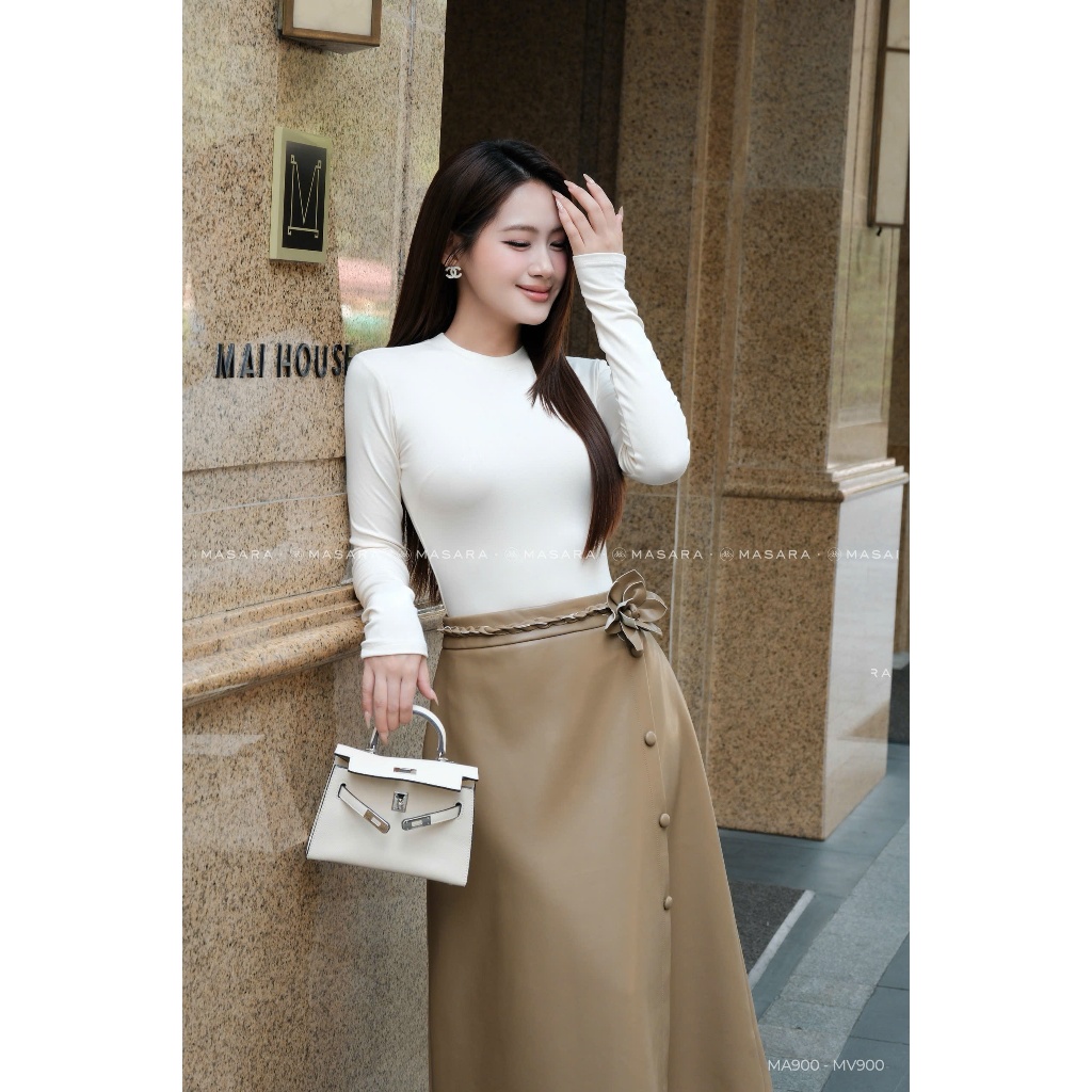 Chân váy da nâu Masara dáng midi thanh lịch, thiết kế xoắn eo phối hoa da cài rời sang trọng MV900