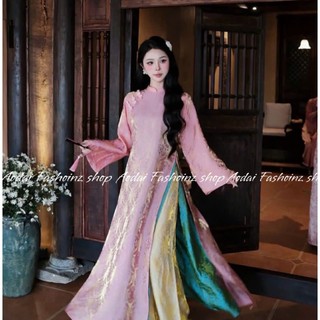 Áo dài lụa tằm óng, chạm nhẹ là thấy xuân 🌸 Một chút lụa tằm, đủ làm ngày dịu lại.Dịu dàng trong từng sợi tơ óng ánh