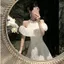Váy đầm trắng trễ vai cổ yếm liền cổ đeo vai con gái kiểu Pháp phong cách Hepburn váy đầm dự tiệc