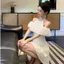 Váy đầm trắng trễ vai cổ yếm liền cổ đeo vai con gái kiểu Pháp phong cách Hepburn váy đầm dự tiệc