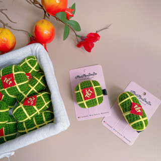 Kẹp tóc hình bánh chưng bánh tét bằng len cho bé