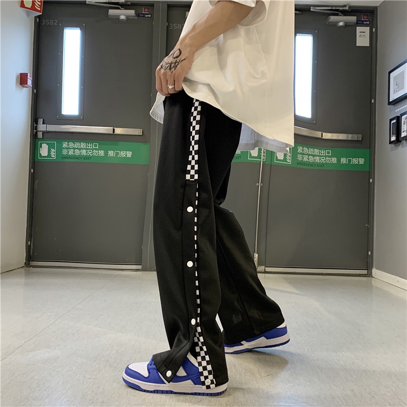 Quần suông unisex đóng cúc cạp chun Quần dài ống rộng nam nữ xẻ tà có cúc bấm để đóng mở tà đen phối caro  T23G