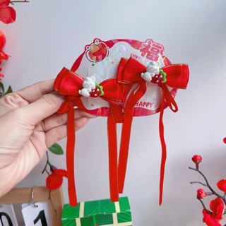 Set 2 kẹp tua rua tone đỏ cho bé phù hợp lễ tết