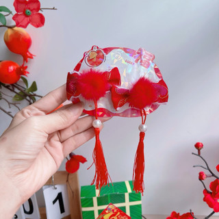 Set 2 kẹp tua rua tone đỏ cho bé phù hợp lễ tết