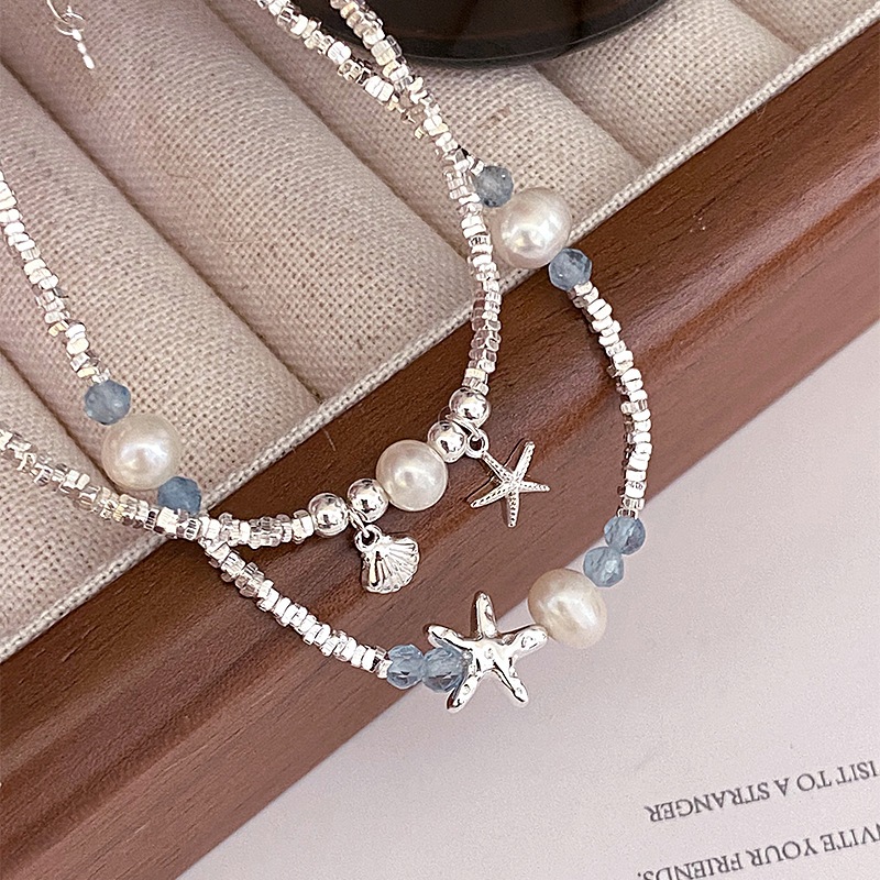 Vòng tay đính ngọc trai sao biển hợp kim cao cấp chống rỉ phai màu