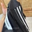 Set bộ nỉ nữ GUMIN thiết kế áo có mũ phối sọc thêu logo bad ngực kèm quần dáng suông bo rút dây gấu sang trọng cao cấp