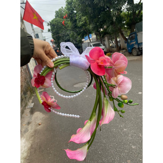 bó hoa cưới cầm tay cô dâu Orchird Pink hoa Lan va rum