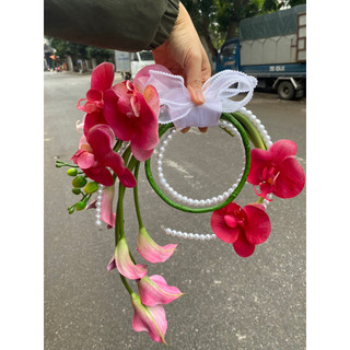 bó hoa cưới cầm tay cô dâu Orchird Pink hoa Lan va rum
