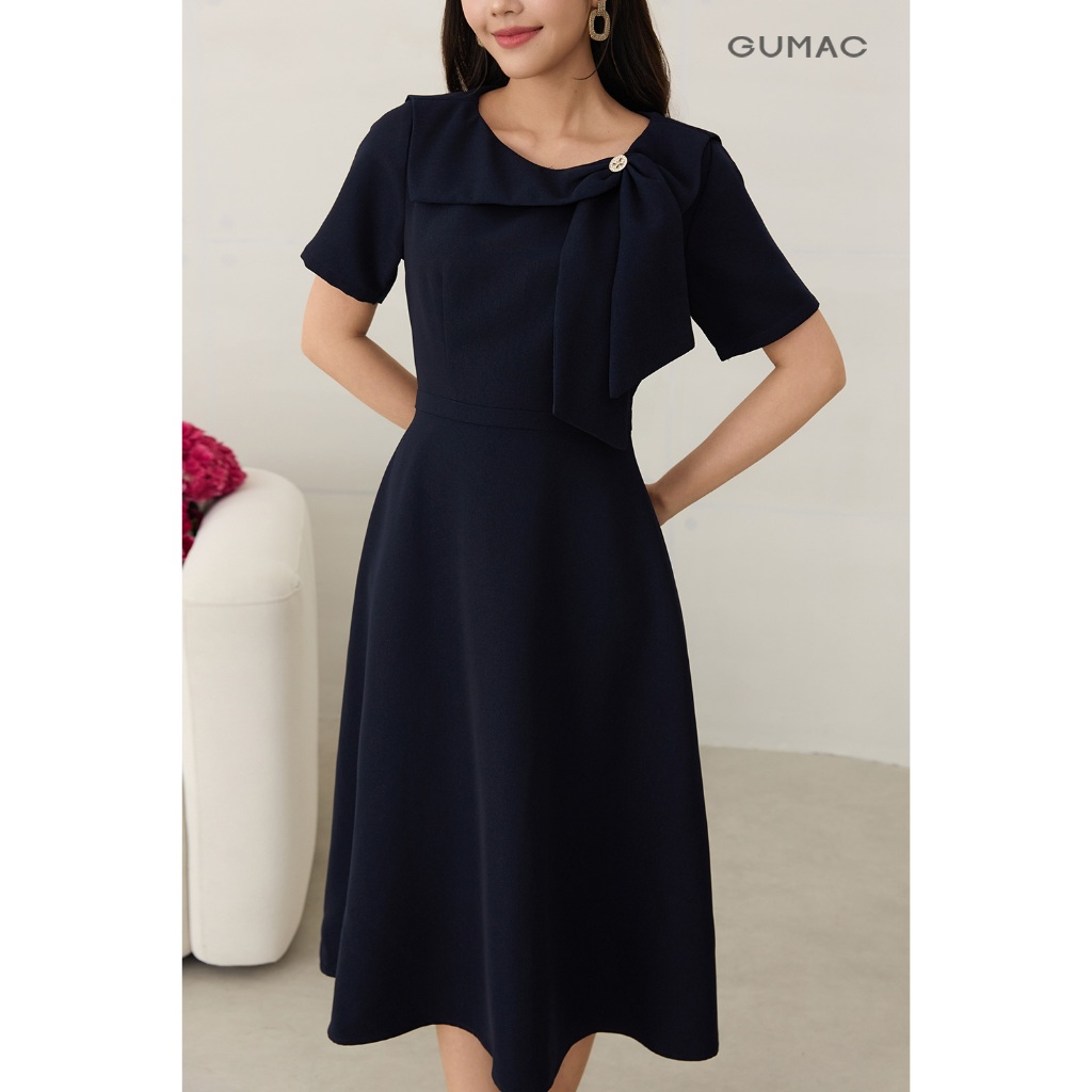 Đầm Nữ GUMAC Form Xòe Cổ Xếp Cánh Nơ Đính Nút Kim Loại Chất Tuyết Mưa Sang Trọng DF12005