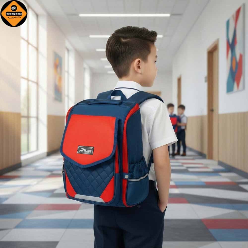 Balo Chống Gù Bé Trai Xbags XB 3106 Màu Đỏ Năng Động, Nhẹ Êm, Ngăn Mở 180°, Bảo Vệ Lưng Cho Bé!