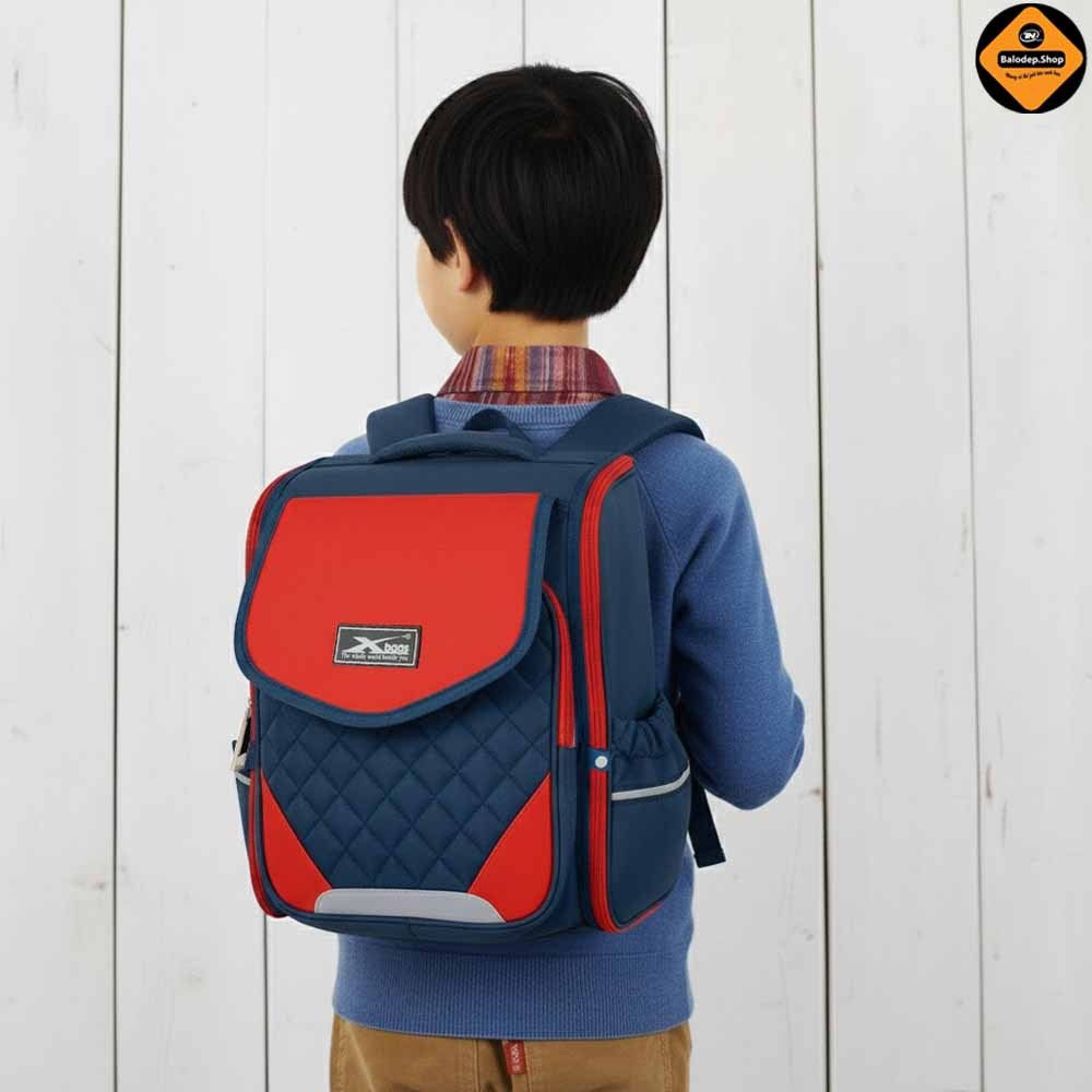 Balo Chống Gù Bé Trai Xbags XB 3106 Màu Đỏ Năng Động, Nhẹ Êm, Ngăn Mở 180°, Bảo Vệ Lưng Cho Bé!
