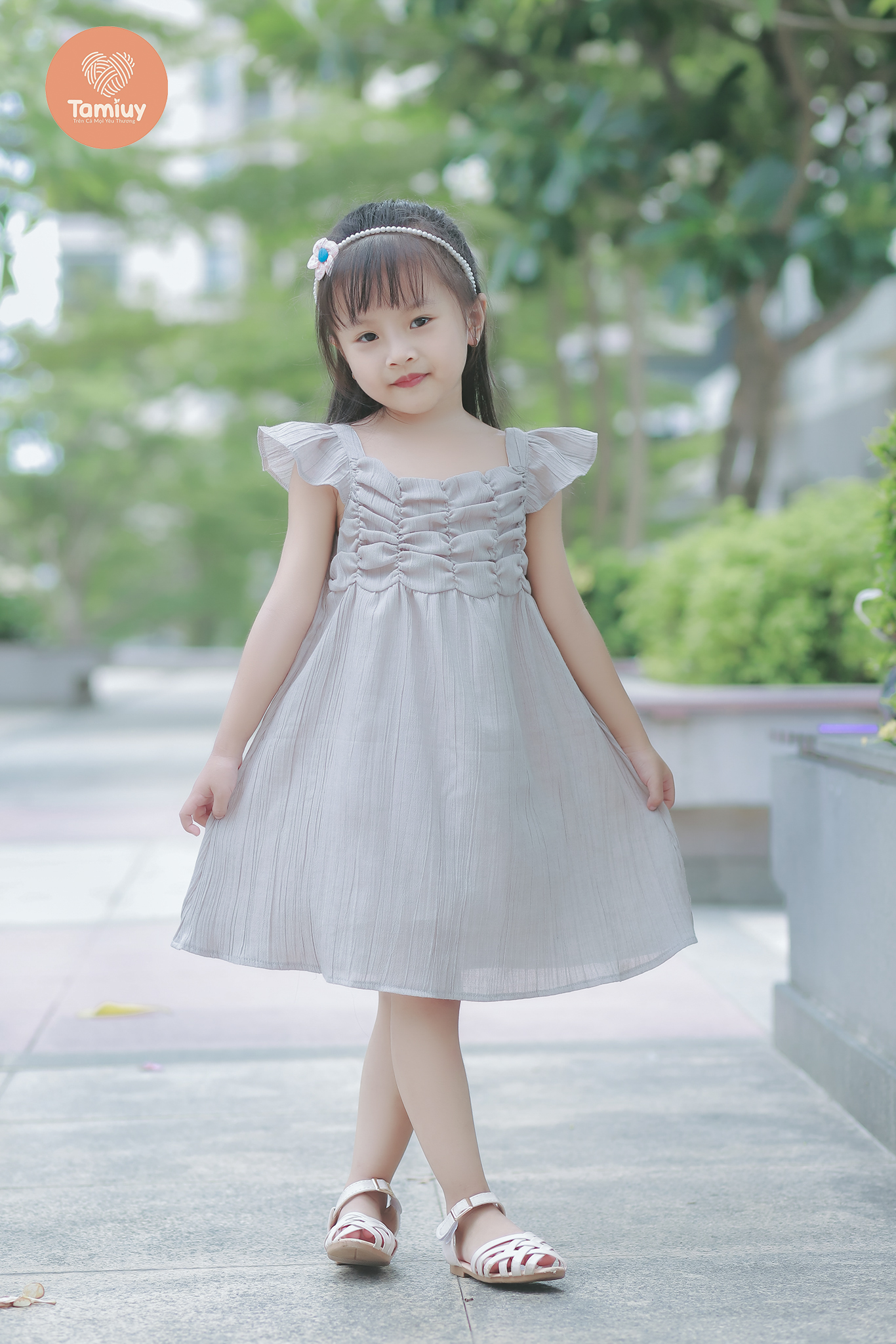 Mô tả Đầm Bé Gái Tamiuy Thiết Kế Tay Phồng Cánh Tiên, Dún Ngực, Cotton Mềm (1-10T) - 1