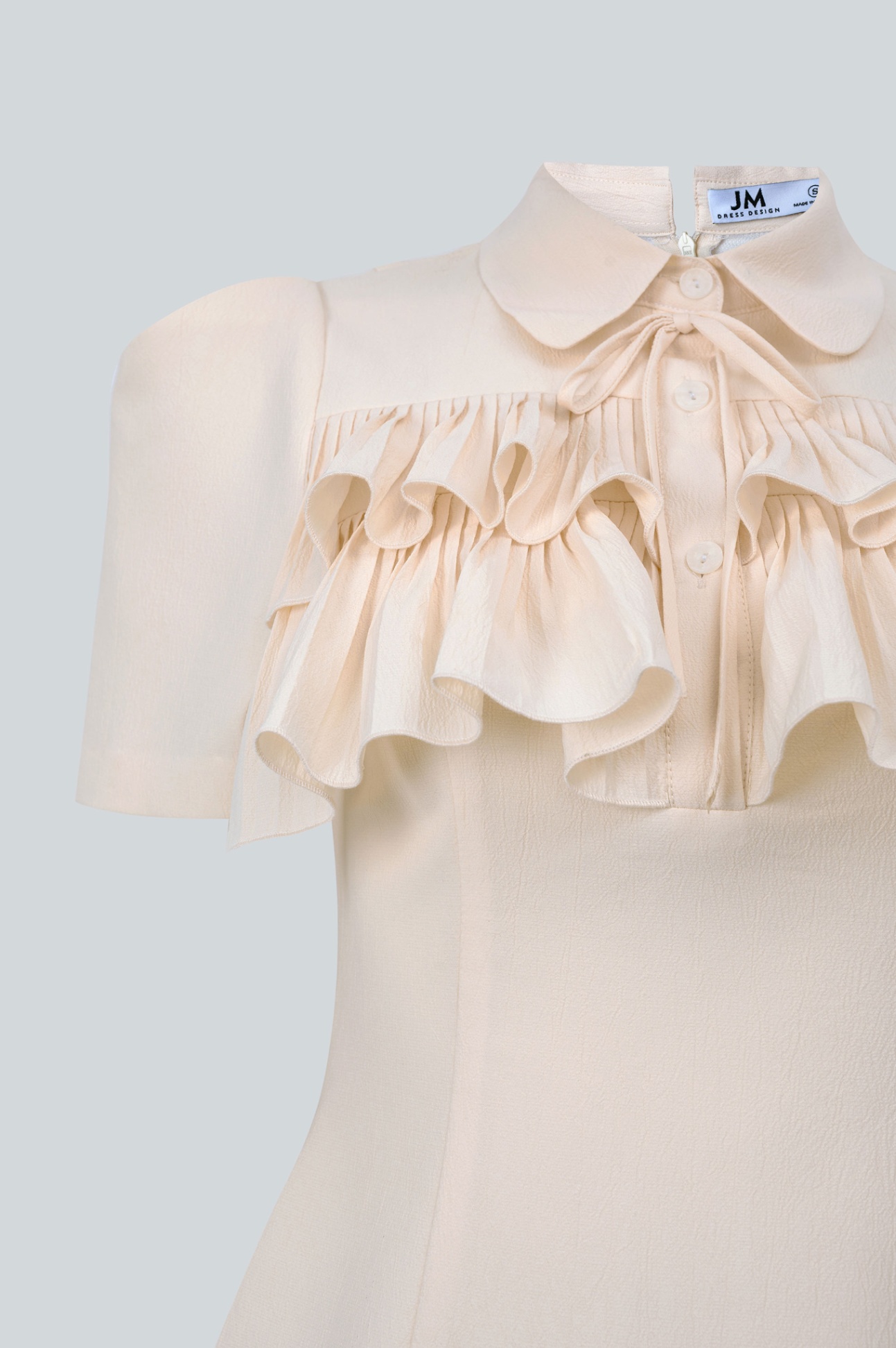 Mô tả Đầm A tay ngắn cổ tròn, xếp ly ngực dáng tiểu thư thiết kế bởi JM Dress Design 1S34.2404OG - 2