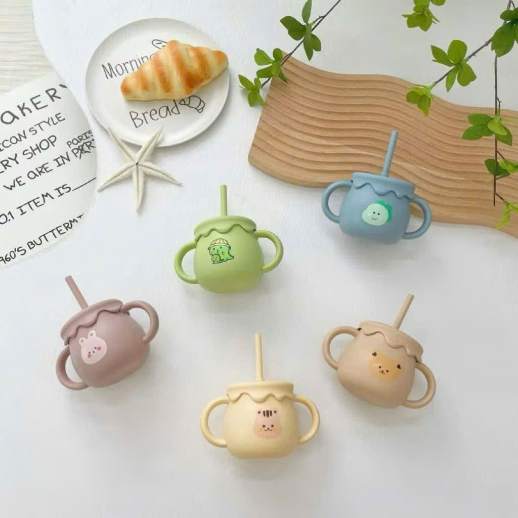 Mô tả Cốc tập uống nước silicon KidAndMom có chức năng đẩy nắp đậy tiện lợi,Cốc tập hút cho bé - 1
