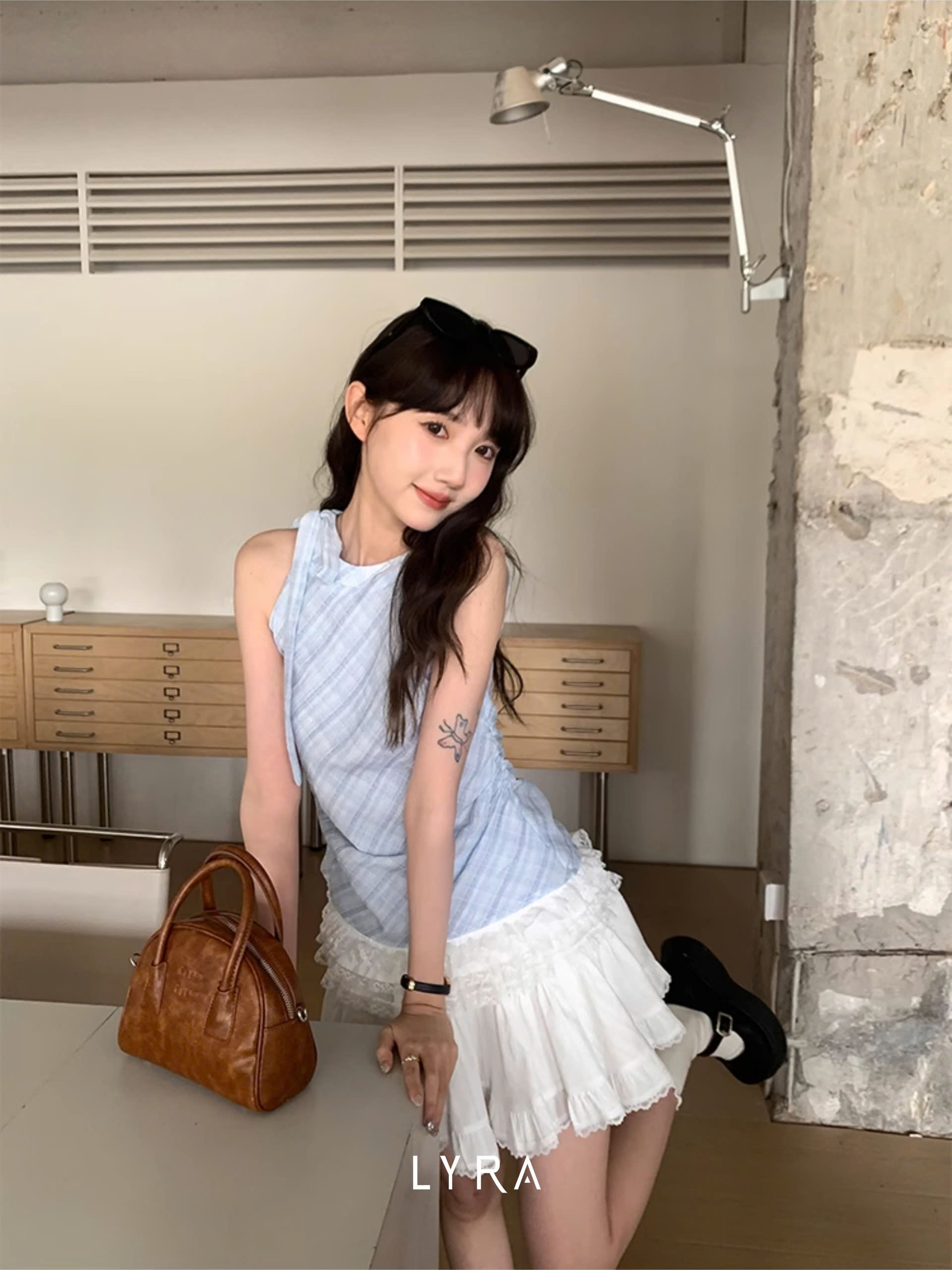 Mô tả LYRA - Áo Yếm Kẻ Cách Điệu Dây Nơ Viền Ren Nhún Eo Phong Cách Tiểu Thư Hàn Quốc - CSYAC0290 - 1