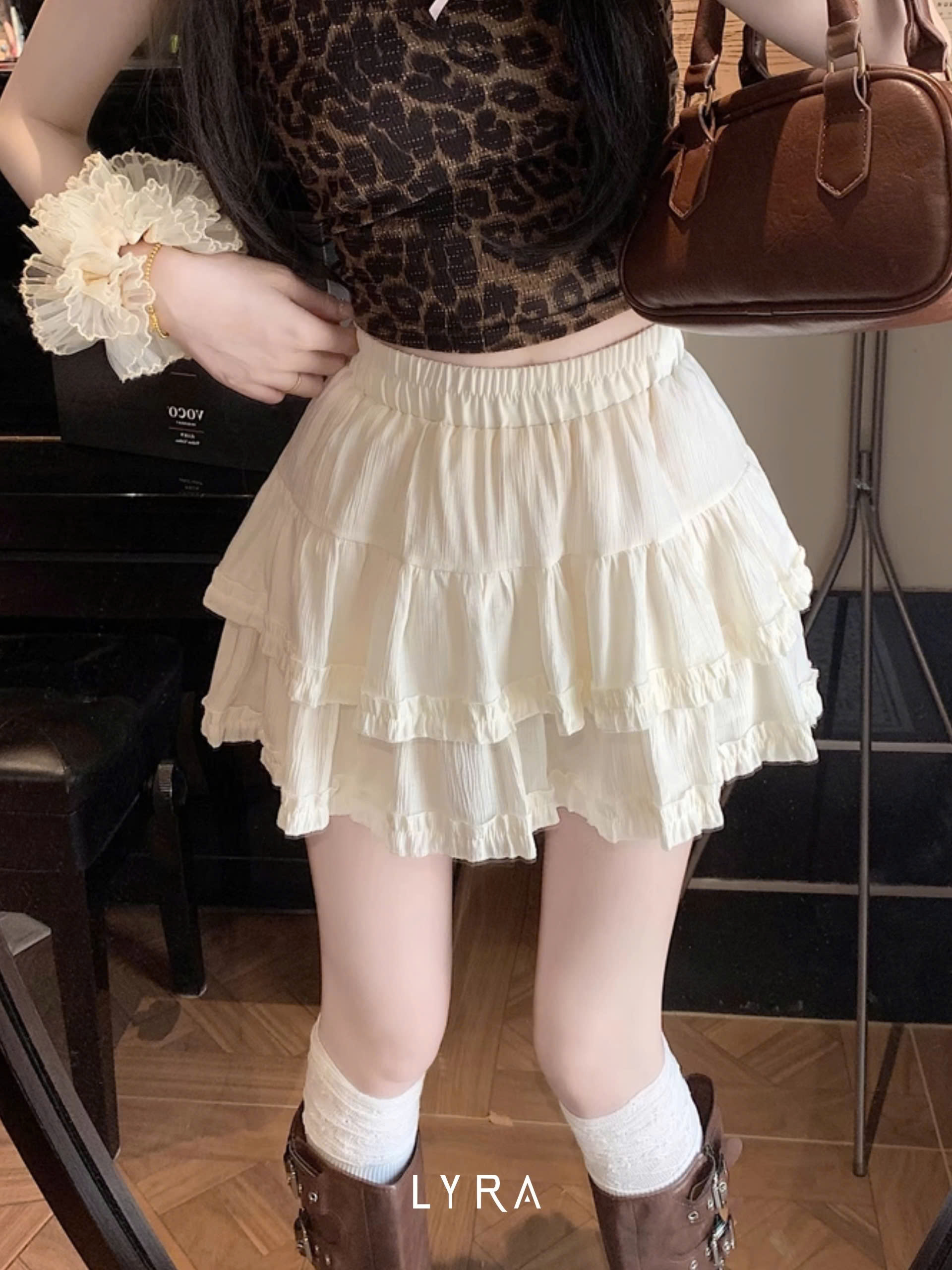 Mô tả LYRA - Chân váy ngắn 2 tầng phồng xòe phối viền ren cạp chun nhiều màu dễ phối đồ - CSYCN0220 - 1