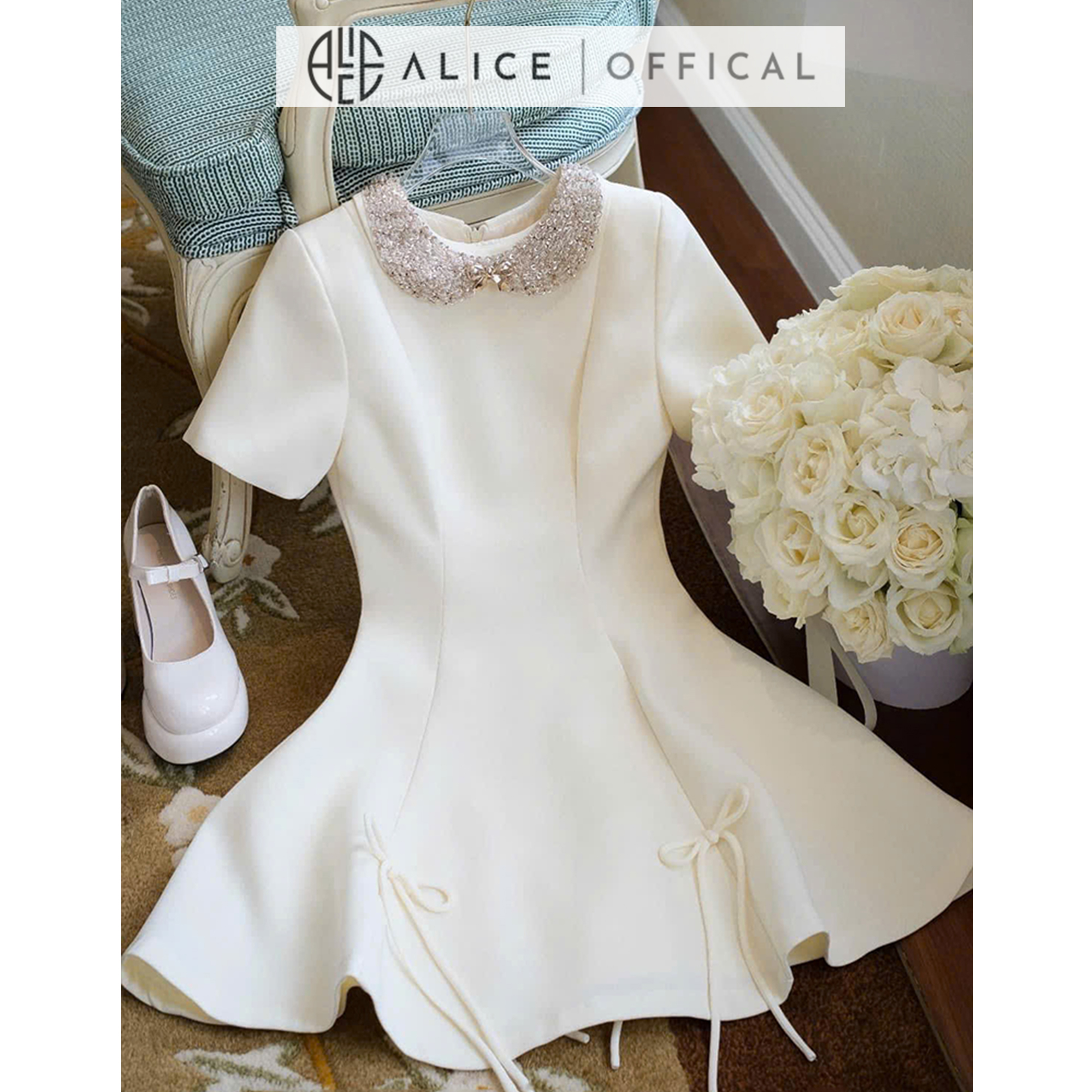 Mô tả Váy Đầm Tiểu Thư Tay Ngắn Dáng Xòe Alice Cổ Xích Đính Đá Chất Liệu Chéo Rubi Có Chiết Eo V1260 Đính Nơ Chân Váy - 2