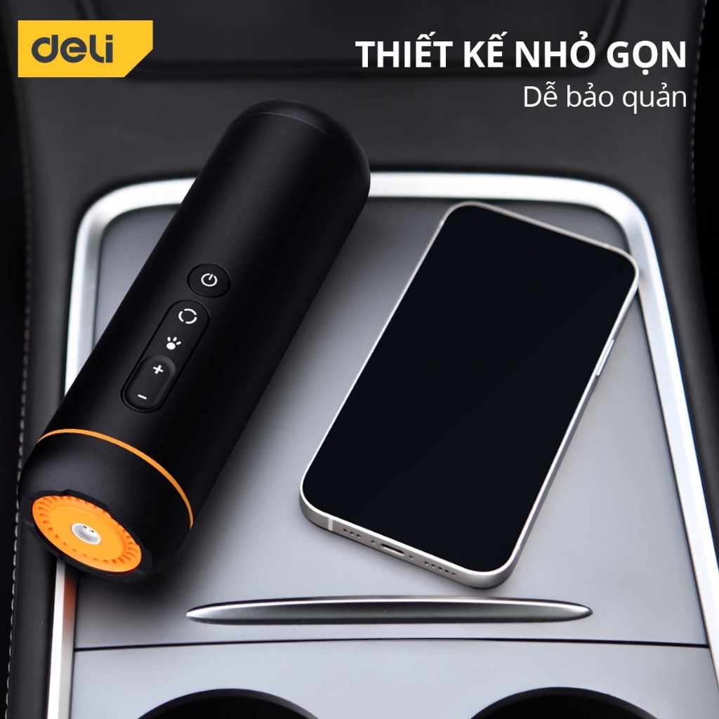Máy bơm lốp Deli DL-mini1 màu đen đặt trong hộc xe, thấy rõ màn hình và các nút điều khiển
