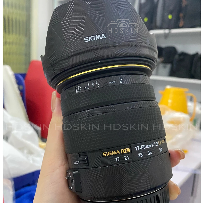 Miếng dán máy ảnh skin 3M vân nổi cho Sigma 17-50 for canon/ nikon ...
