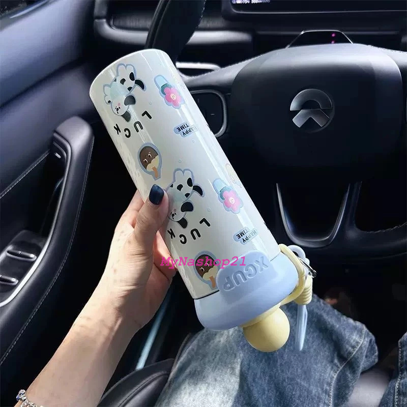 Bình giữ nhiệt 600ml nắp chống tràn, thiết kế tiện lợi với quai xách cho học sinh và dân văn phòng 2025.