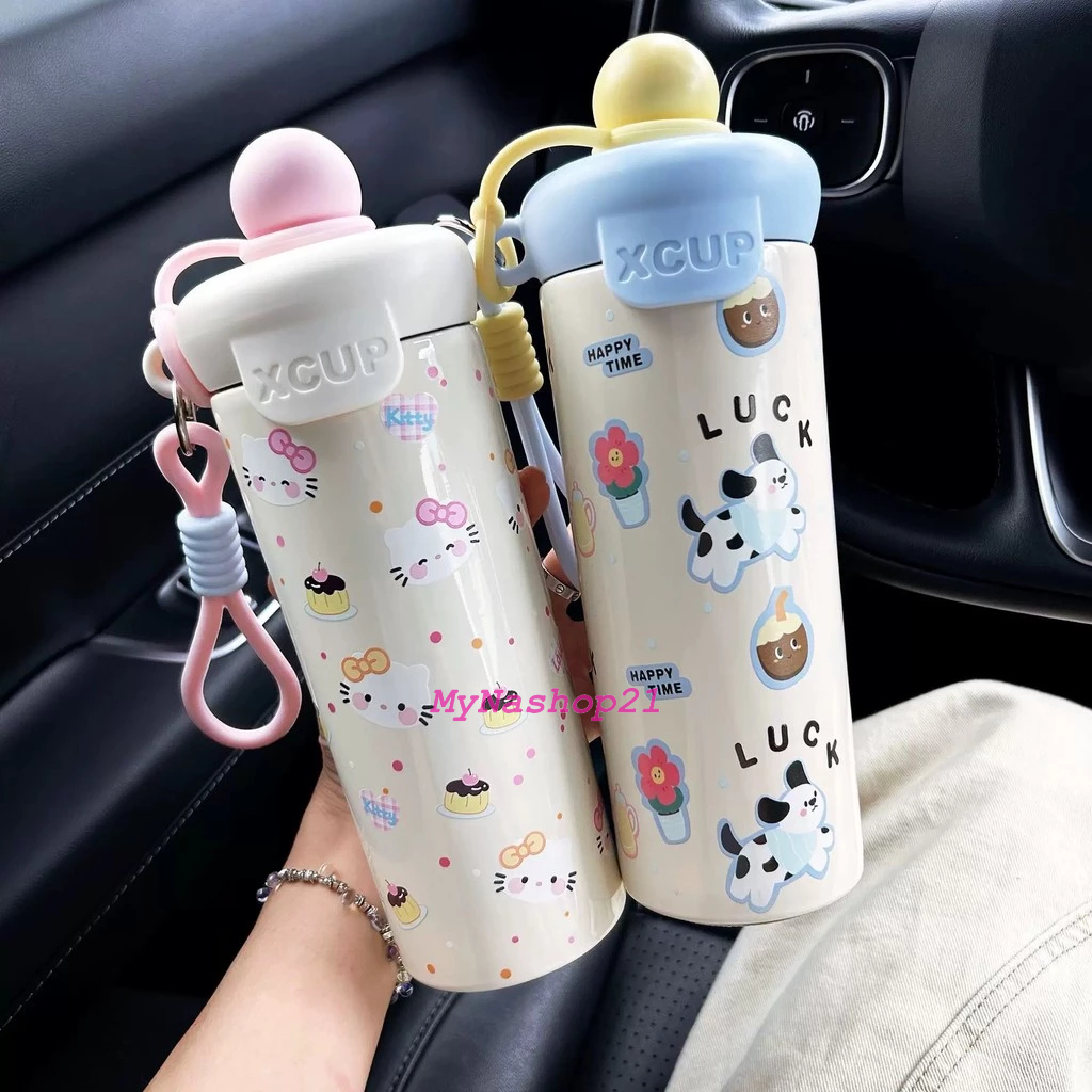 Bình giữ nhiệt 600ml nắp chống tràn, thiết kế tiện lợi với quai xách cho học sinh và dân văn phòng 2025.