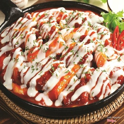 Đùi gà nướng bánh gạo cay với phô mai