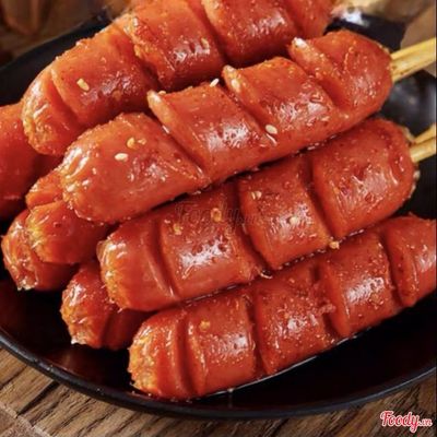 Xúc xích lắc tê cay- 1 cây