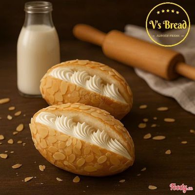 Bánh mì nhân kem sữa,phủ hạnh nhân -T’Cures Golden Of Flower
