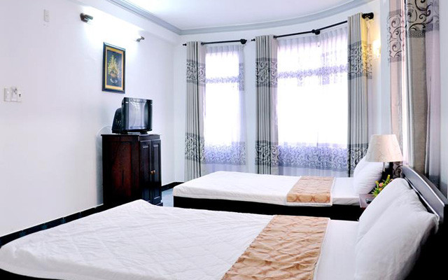 Huy Hoàng Mini Hotel - Triệu Quang Phục