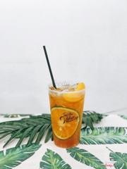 Peach iced tea with orange and lemongrass