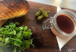 Goosr liver pate with redwine jus jelly, pear chutneys, watercress salad, gherkin and toasted sour dough