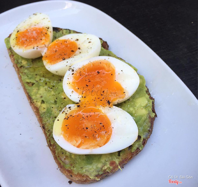 Avocado mashed with soft boiled eggs